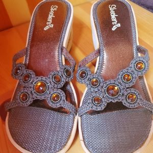 Brown Skechers sandal